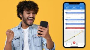 man holding phone happy to use mileage tracker app