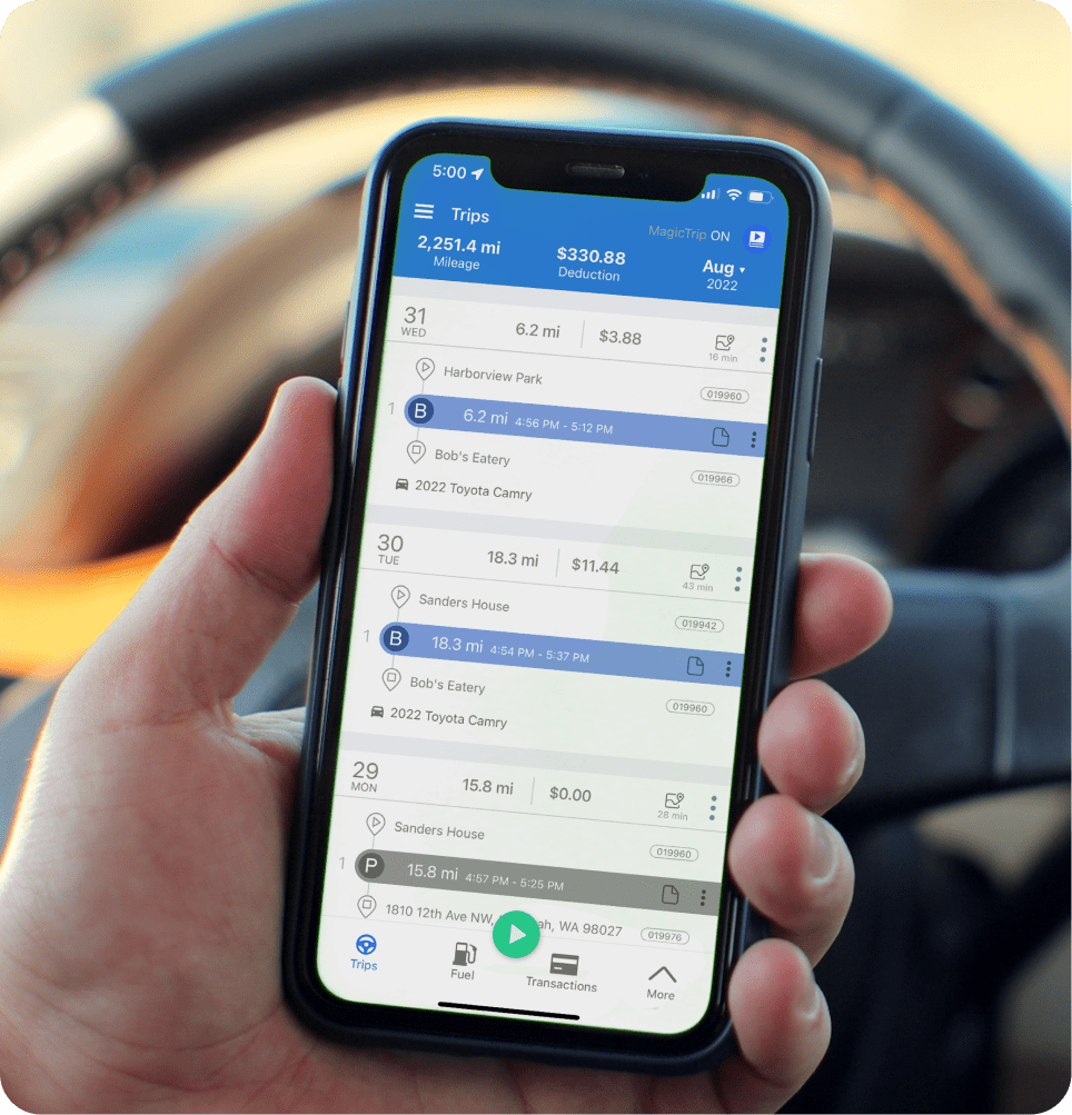 rideshare uber lyft doordash driver holding phone with triplog