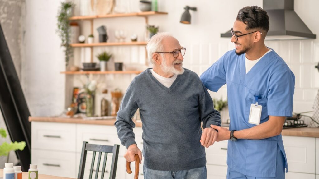 healthcare provider helping patient maybe using evv