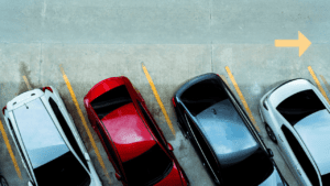cars parked in a parking lot overhead photograph