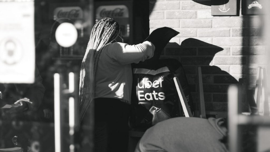 Uber Eats driver is packing up customers’ food for delivery 