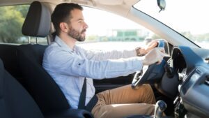 person driving in car going to dmv to get car registration to deduct on taxes