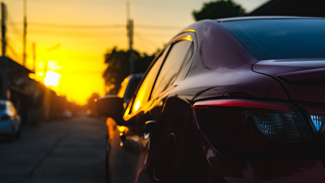 irs mileage rate history cover image - car driving