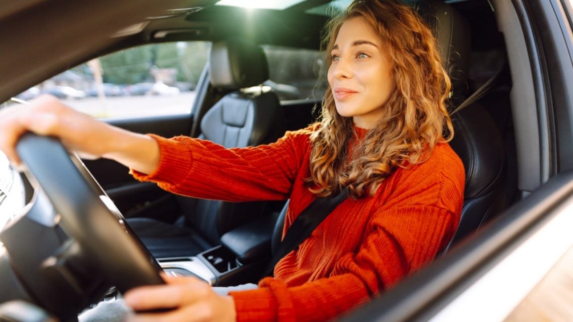 doordash driver driving in her car to get doordash rewards